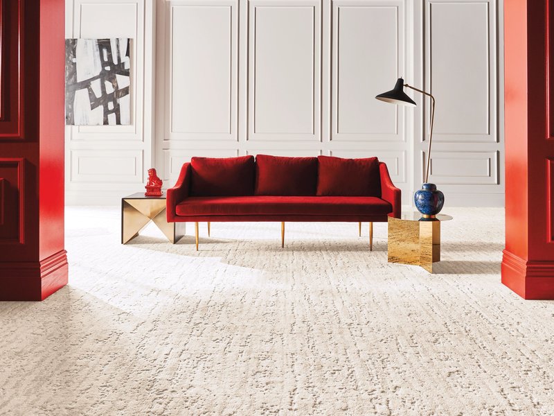Red Couch & Nylon Carpet from Farrior's Flooring in Wallace, NC